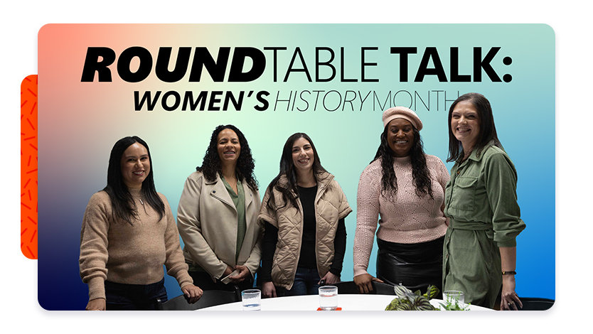 Image of five women of different backgrounds standing at a table, with the words “Roundtable talk: Women’s History Month” on the image