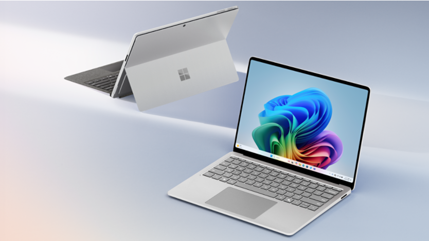 An image of Microsoft Surface Pro 11ᵗʰ Edition with Pro keyboard and Surface Laptop 7ᵗʰ Edition with Copilot+ PC Bloom pictured on screen