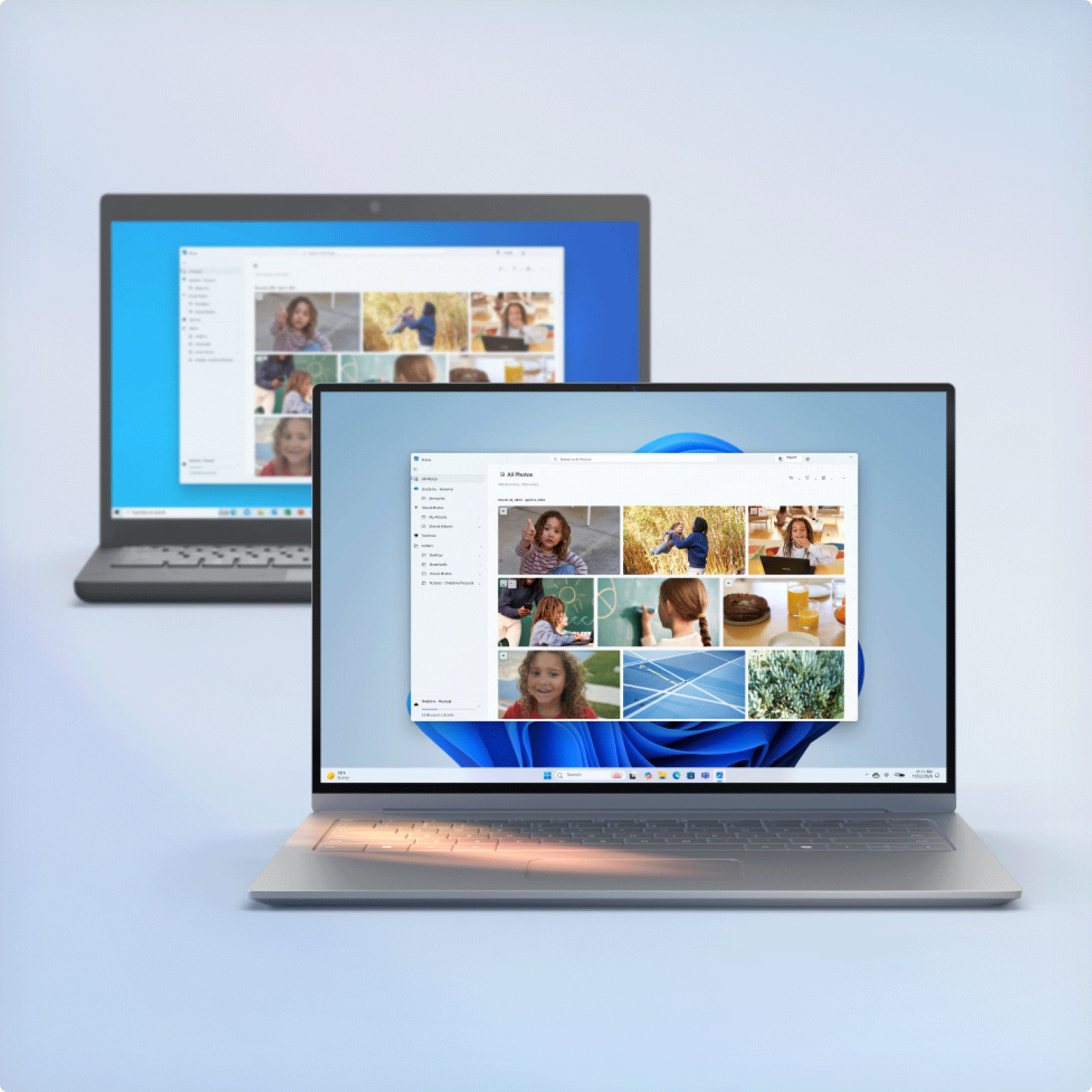 Two Microsoft laptops open and displaying the same Photos app, one with the Windows 10 screen and one with the Windows 11 blue bloom screen