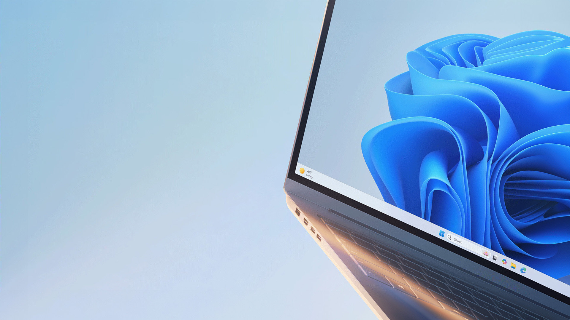 Windows PC with blue Windows bloom on a light blue background