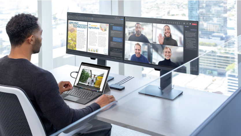 Surface device with a dual monitor