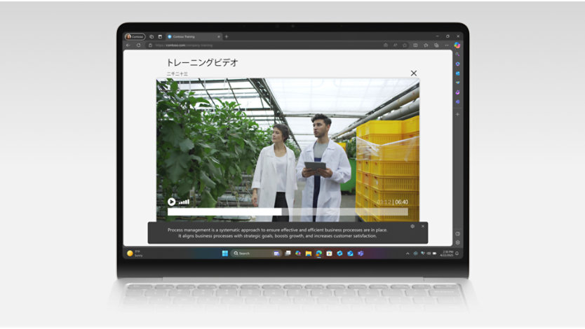 Open Surface Laptop showing live captions during a meeting