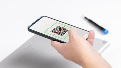 Person photographing documents with phone