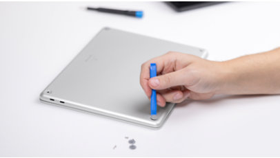 Person repairing Surface Laptop