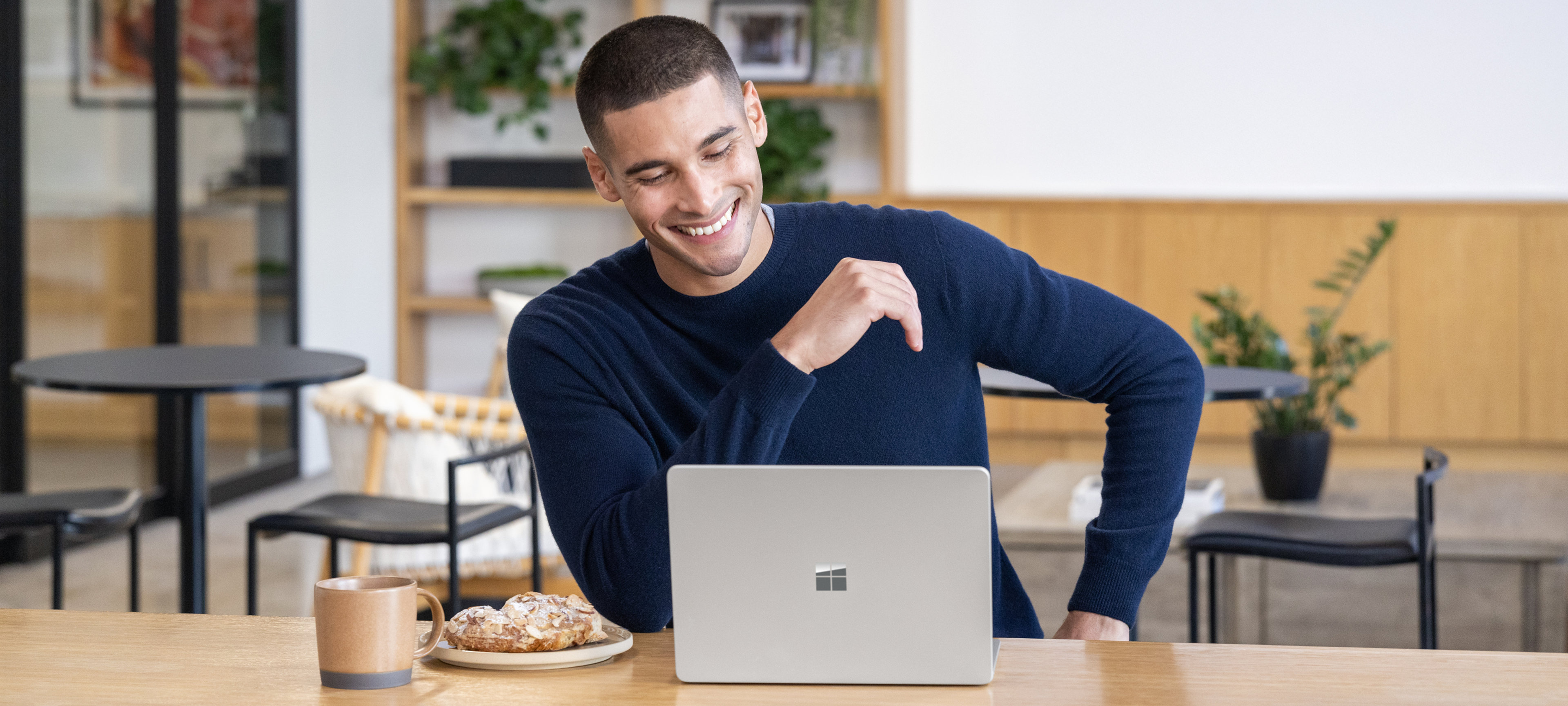 Person looking at Surface Laptop