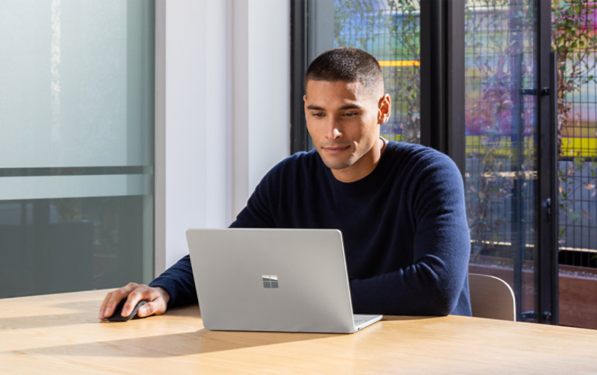 Man with Surface Laptop