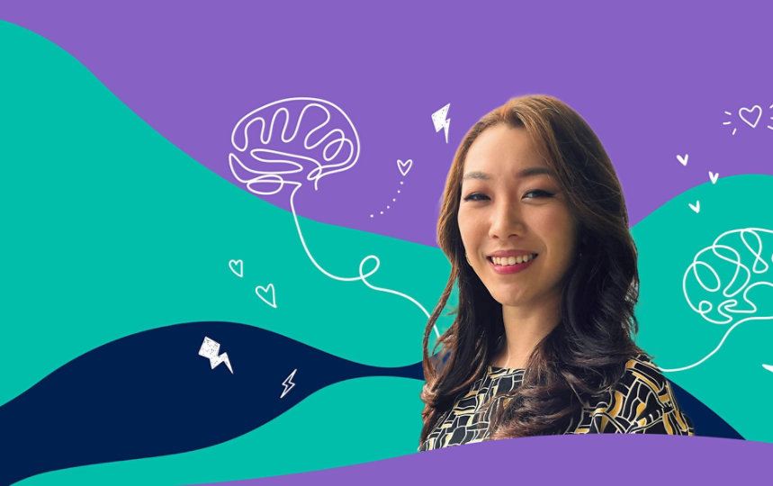 Cecilia Fang smiling in front of a colorful background