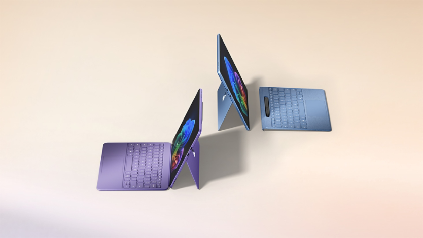 Two color Surface 2-in-1s displaying kickstand and detachable keyboard